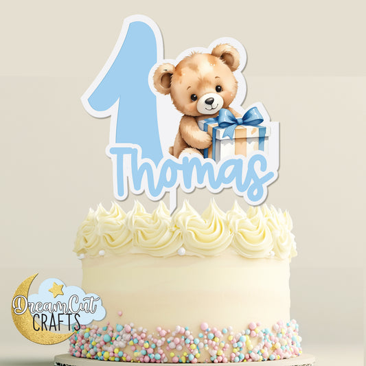 Personalized Teddy Bear cake topper for baby showers and kids’ birthdays. Laser-cut acrylic with UV print, custom number, color accents, and optional name. Made to order.