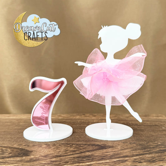 Custom ballerina cake topper with white organza tutu and personalized birthday number on cake
