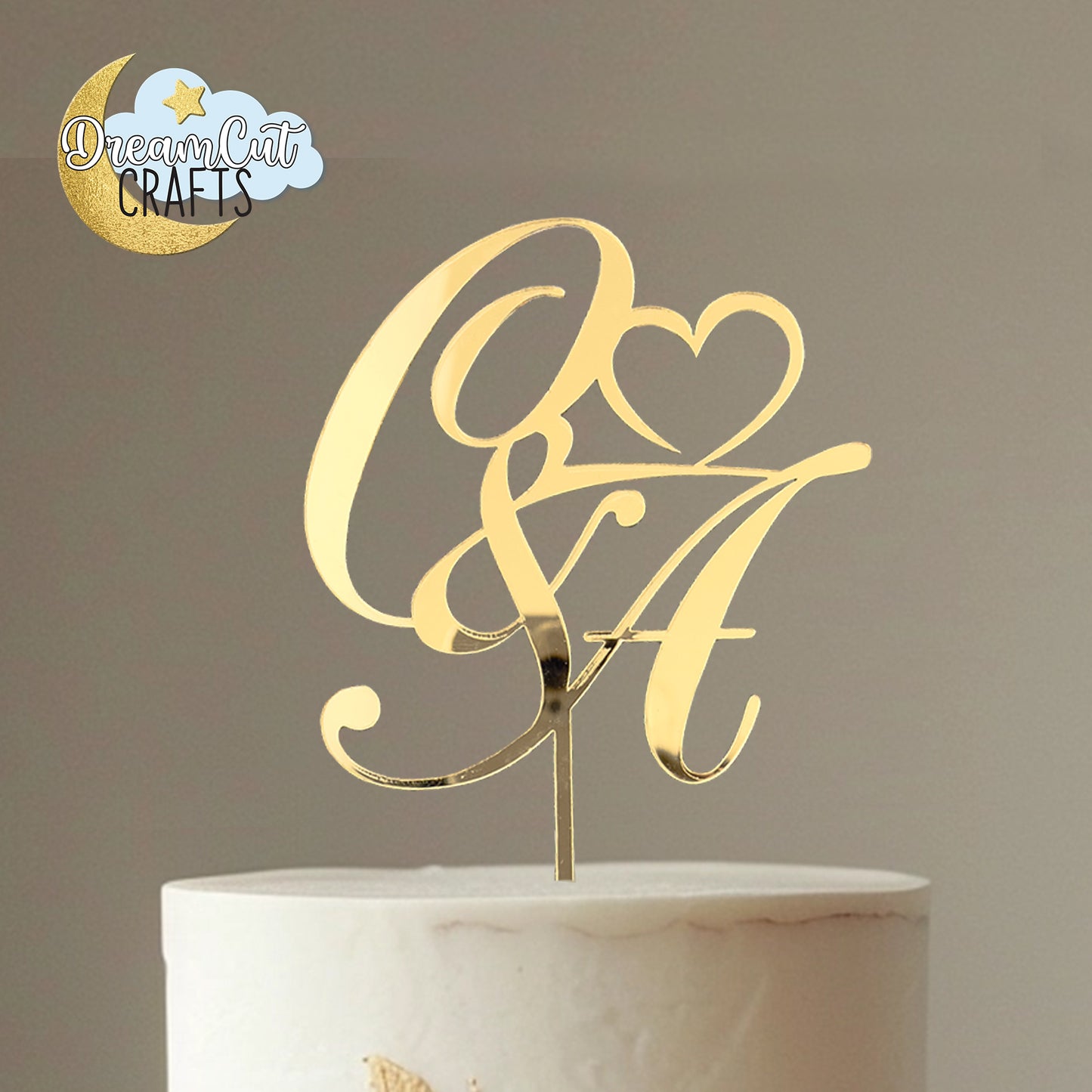 Custom initials wedding cake topper made from 3 mm food grade acrylic, elegant monogram design shown in mirror and solid color options, approx. 4.7 x 4.7 inches