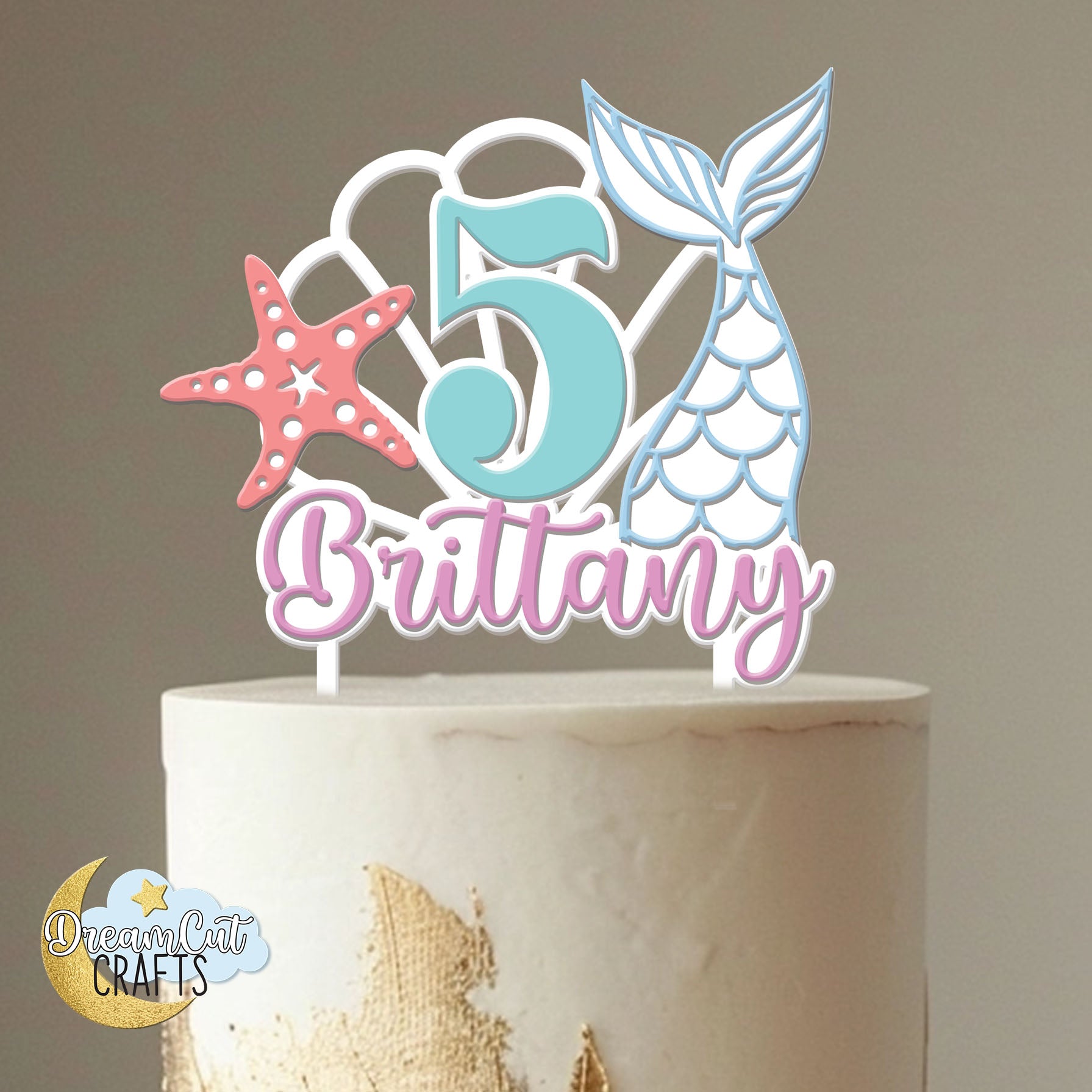 Custom Mermaid Cake Topper with tail, seashell, starfish, age, and name in pastel acrylic for under the sea birthday party.