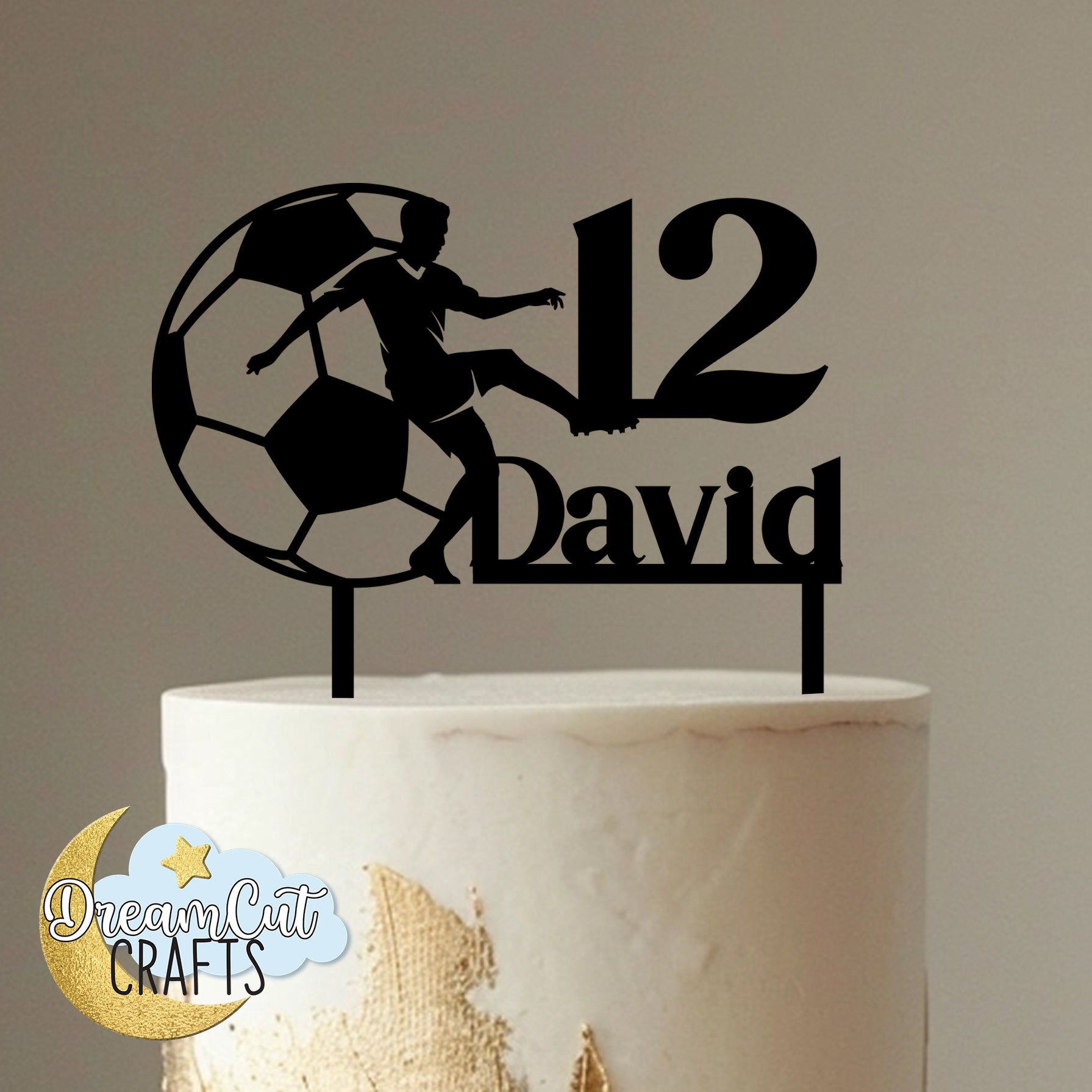 Personalized soccer cake topper with football player silhouette, custom name, and age made from acrylic for sports birthday décor.