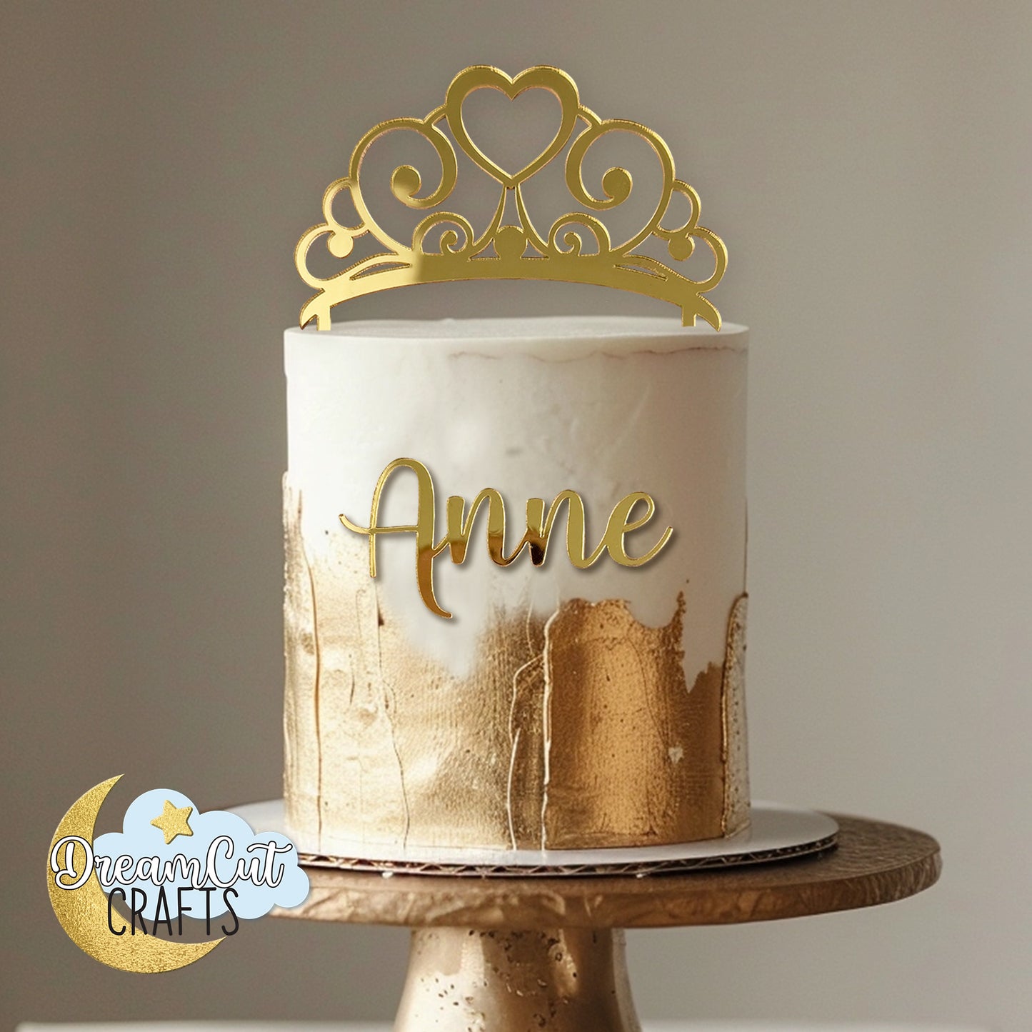Personalized gold mirror acrylic tiara cake topper with custom name in script, elegant princess crown birthday cake decoration
