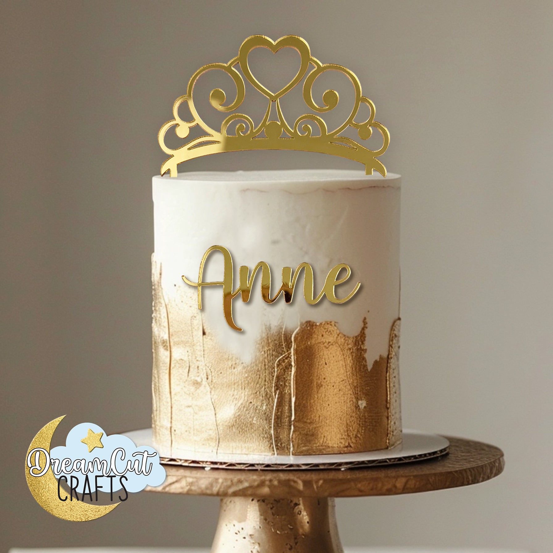 Personalized gold mirror acrylic tiara cake topper with custom name in script, elegant princess crown birthday cake decoration
