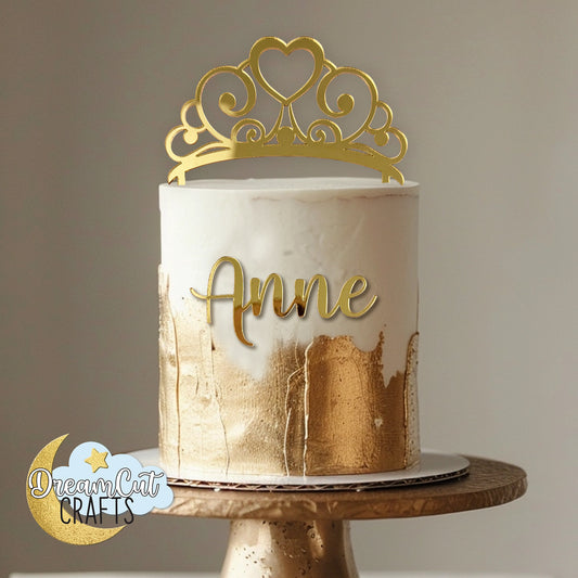 Personalized gold mirror acrylic tiara cake topper with custom name in script, elegant princess crown birthday cake decoration