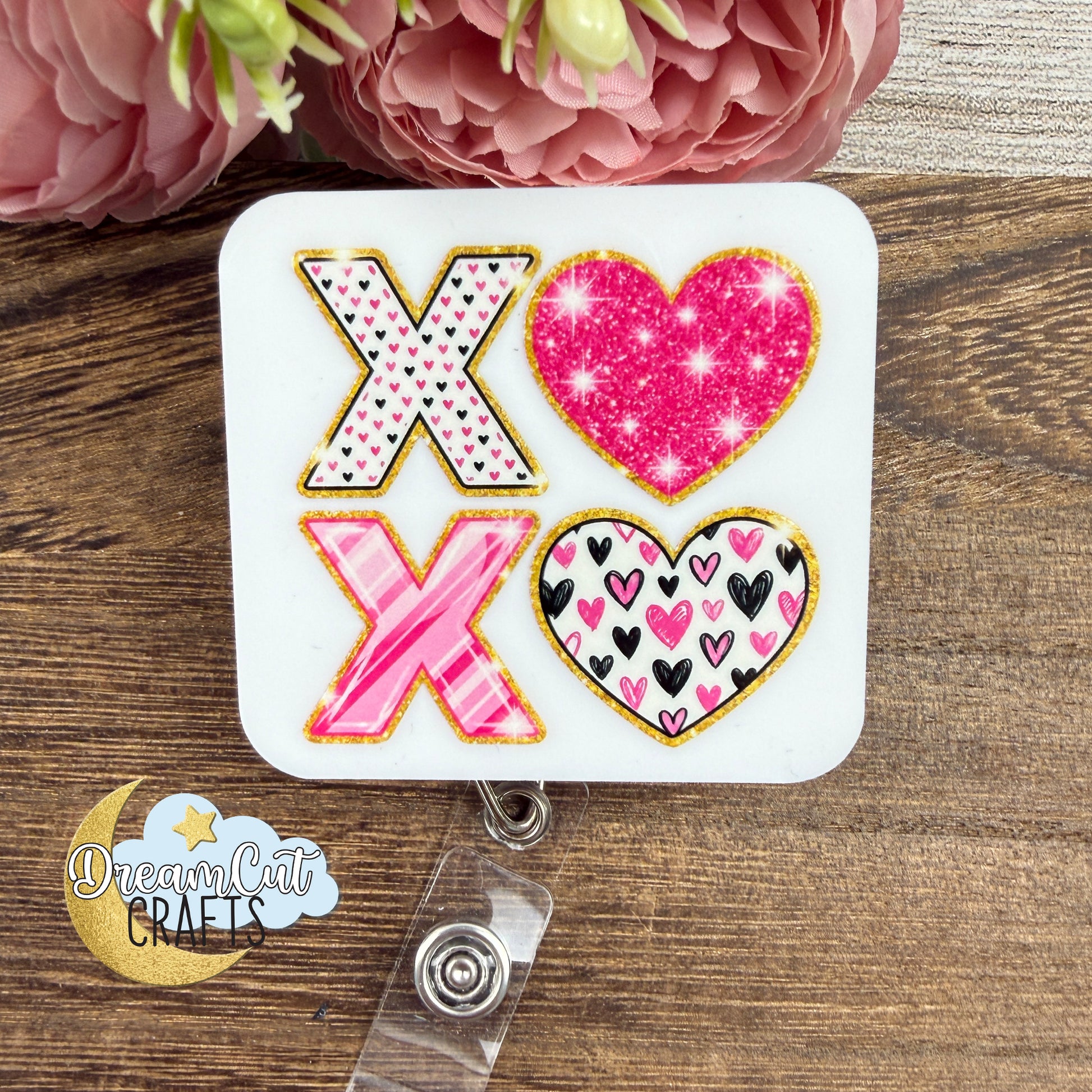 XOXO badge reel top with heart design, UV printed on 3 mm white acrylic, Valentine love theme, size 7 x 6.5 cm.